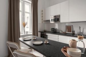Kuchyňa alebo kuchynka v ubytovaní HARBOR APARTMENTS - Damrota