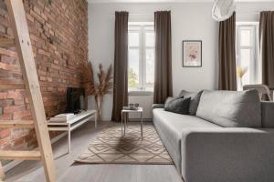 Televízia a/alebo spoločenská miestnosť v ubytovaní HARBOR APARTMENTS - Damrota