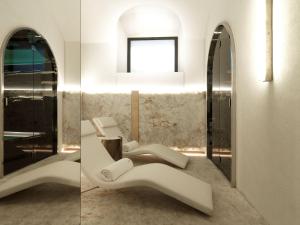 A seating area at STRAF, Milan, a Member of Design Hotels