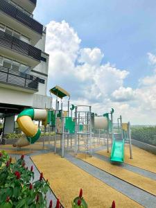 a playground on the side of a building at 1320 Meridin Cozy Legoland Netflix By STAY in Nusajaya +19 photos