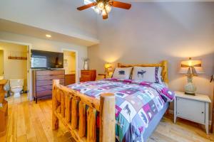 a bedroom with a wooden bed and a bathroom at Incline Village Retreat Near Skiing and Beaches in Incline Village