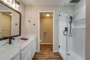 a white bathroom with a sink and a shower at Incline Village Retreat Near Skiing and Beaches in Incline Village +25 photos