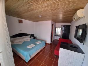 Postel nebo postele na pokoji v ubytování Esmeralda Butik Hotel