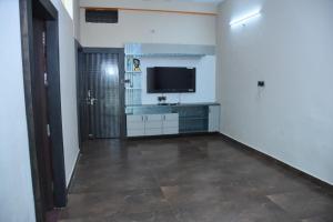 TV a/nebo společenská místnost v ubytování Signature Inn Orchha