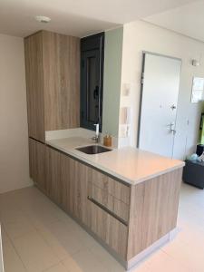 a kitchen with a sink and a counter top at Appartement Punta Prima in Torrevieja