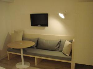 TV a/nebo společenská místnost v ubytování Hotel Restaurant Flaschen