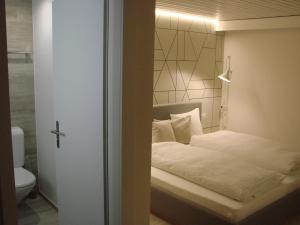 Koupelna v ubytování Hotel Restaurant Flaschen