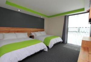 Voodi või voodid majutusasutuse Hotel Brisas Express toas