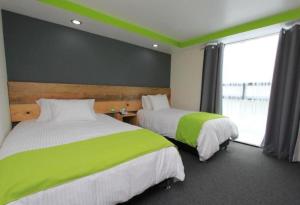 Postel nebo postele na pokoji v ubytování Hotel Brisas Express