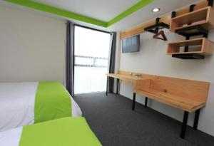 Postel nebo postele na pokoji v ubytování Hotel Brisas Express