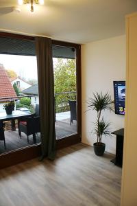 TV a/nebo společenská místnost v ubytování Messe- und Gästezimmer Hildesheim