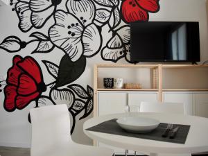 TV i/ili multimedijalni sistem u objektu Libo House, Bologna By Short Holidays