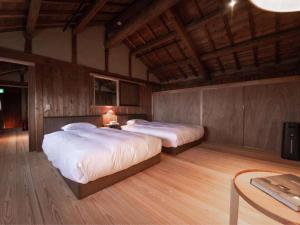 Lova arba lovos apgyvendinimo įstaigoje NIPPONIA HOTEL 伊賀上野 城下町
