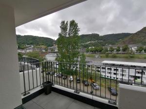 a balcony with a view of a parking lot at FeWo Excellence Juwel in Cochem