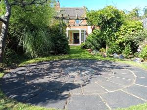 a circle driveway in front of a house at 32 Station Road in Higham on the Hill