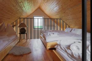 A bed or beds in a room at Meditrine