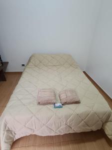 Кровать или кровати в номере HOSTEL RESIDENCIAL SAENZ PEÑA