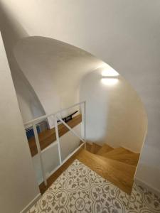 Postel nebo postele na pokoji v ubytování Sull'arco della Gnostra