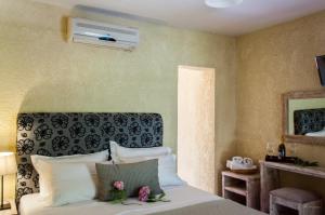 Postel nebo postele na pokoji v ubytování Guesthouse Kalypso
