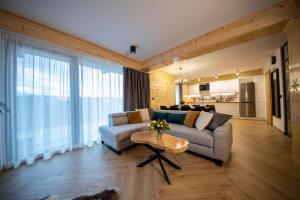 Køkken eller tekøkken på Buńdowe Wzgórze domki na wynajem