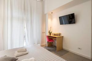 Televízia a/alebo spoločenská miestnosť v ubytovaní St Peter Rooms