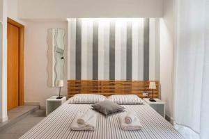 Posteľ alebo postele v izbe v ubytovaní St Peter Rooms