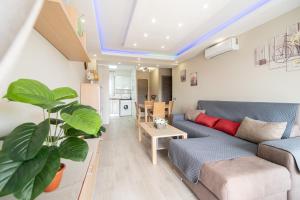 Posezení v ubytování TuristMar - Acogedor apartamento a solo 50m de la Playa, Salou