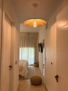 Photo de la galerie de l'établissement Zen Garden Apartment, à Vera 63 autres photos