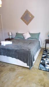 Chalézinho Santorini & Eventos客房内的一张或多张床位