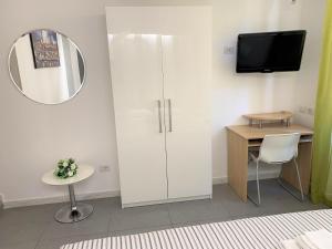 Televízia a/alebo spoločenská miestnosť v ubytovaní St Peter Rooms