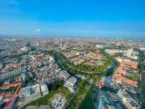 an aerial view of a city with buildings and a river at The Jewel of La Casa III in Surabaya