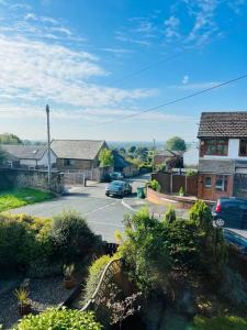 a view of a street in a residential neighborhood at Willow Cottage - Billinge Wigan, sleeps 4 , parking and garden in Billinge