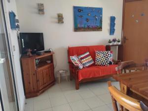 A television and/or entertainment centre at Casa Terrasini