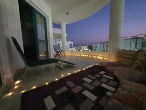 Μπαλκόνι ή βεράντα στο Relaxed sea view chalet