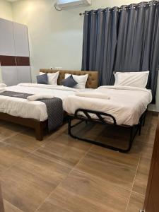 Postel nebo postele na pokoji v ubytování Serene Villa