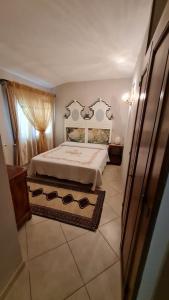Katil atau katil-katil dalam bilik di B&B Corte dei Ducati