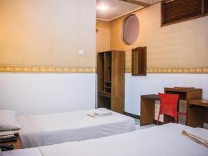 Krevet ili kreveti u jedinici u okviru objekta Hotel Sukamulya Pasteur +6 fotografija