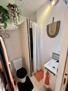 Ванная комната в Le Natanigor - centre gare