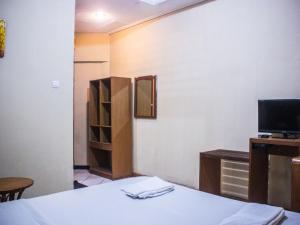 Krevet ili kreveti u jedinici u okviru objekta Hotel Sukamulya Pasteur