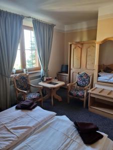 Postel nebo postele na pokoji v ubytování Hotel PAM