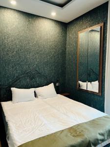 Postel nebo postele na pokoji v ubytování Hotel Nordmann,Racha