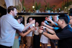 a man standing in front of a group of people at Mad Monkey Dumaguete in Dumaguete +97 photos