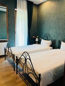 Postel nebo postele na pokoji v ubytování Hotel Nordmann,Racha