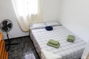Postel nebo postele na pokoji v ubytování EconomicMalagaRooms