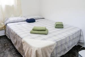 Postel nebo postele na pokoji v ubytování EconomicMalagaRooms
