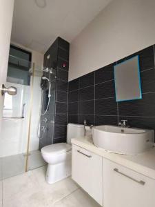 a bathroom with a sink and a toilet and a shower at A0803 Platino walking ParadigmMall TVbox By STAY in Johor Bahru