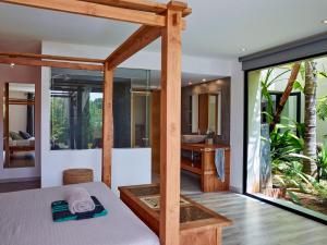 A bed or beds in a room at Can Do It Még 37 kép