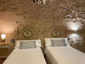 Postel nebo postele na pokoji v ubytování Casa Lidia - Antigua Posada Real