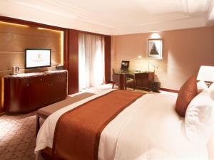 Katil atau katil-katil dalam bilik di Optics Valley Kingdom Plaza Wuhan