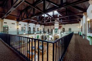 a large building with a lobby with a staircase at Port of the Islands M264 in Naples